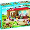 playmobil granja maletin muñeca